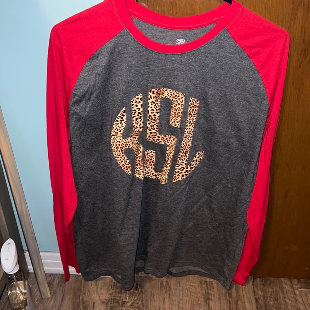 Shirt with KSL initials. Never worn! Performance blend long sleeve top